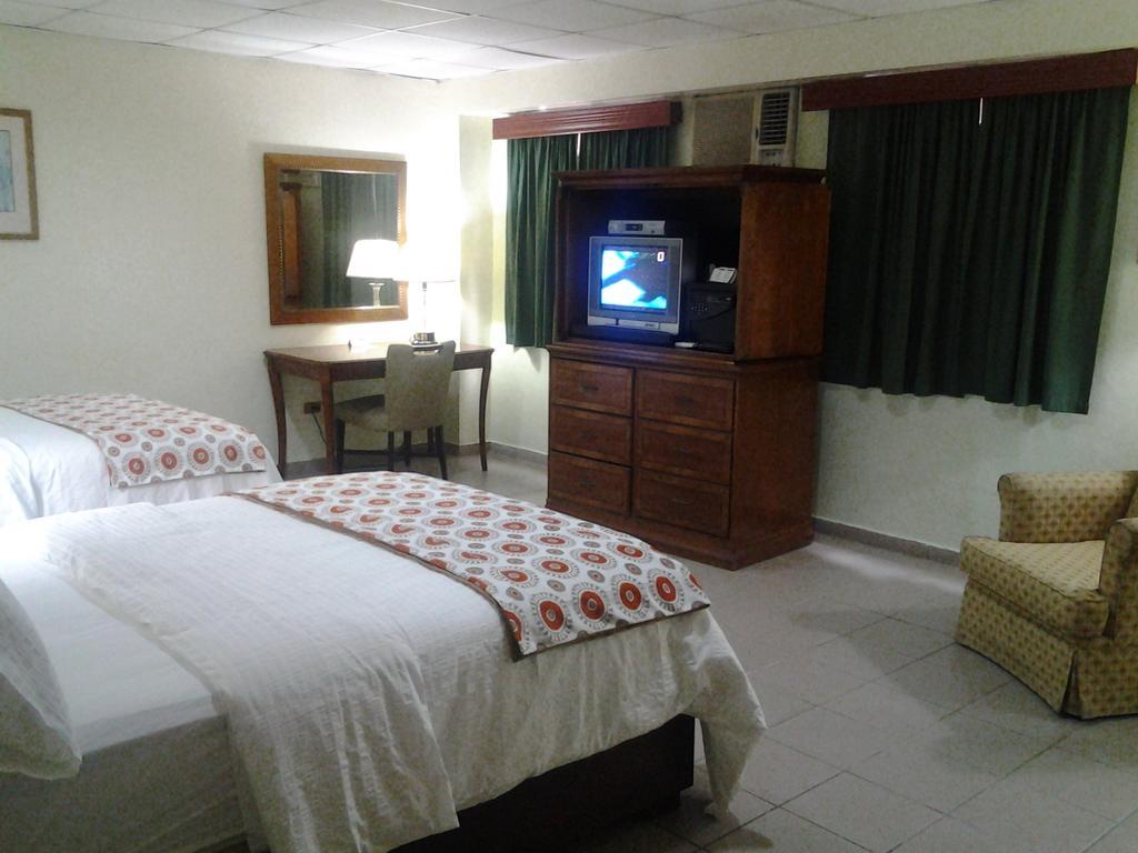 Micro Hotel Condo Suites Санто-Доминго Номер фото